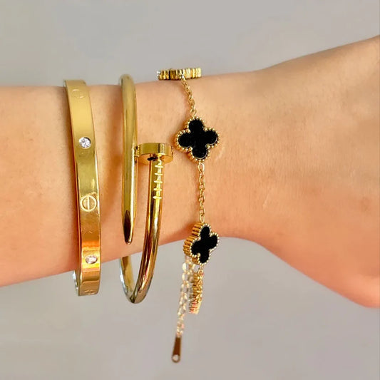 Cartier, Nail and Black Clover Bracelet Stack