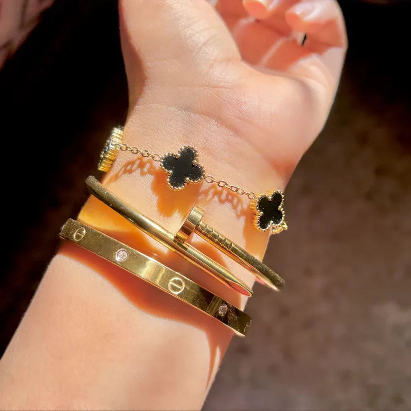 Cartier, Nail and Black Clover Bracelet Stack